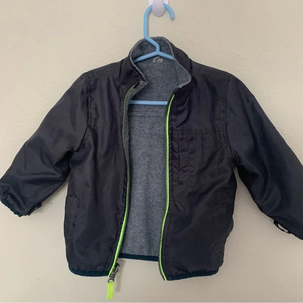 Kids Navy Blue Jacket with Neon Green Accents and zip in removable warm layer‎